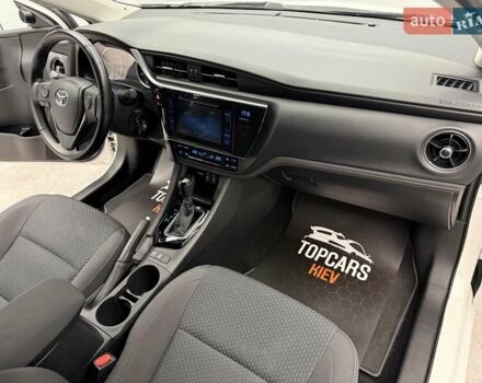 Белый Тойота Королла, объемом двигателя 1.6 л и пробегом 45 тыс. км за 15700 $, фото 32 на Automoto.ua