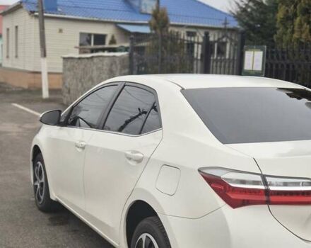 Белый Тойота Королла, объемом двигателя 1.6 л и пробегом 161 тыс. км за 13700 $, фото 5 на Automoto.ua