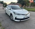 Белый Тойота Королла, объемом двигателя 1.33 л и пробегом 191 тыс. км за 10600 $, фото 1 на Automoto.ua