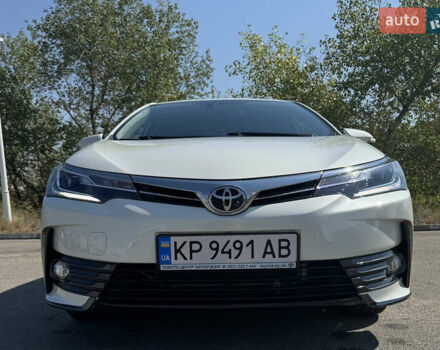 Білий Тойота Королла, об'ємом двигуна 1.6 л та пробігом 23 тис. км за 17499 $, фото 4 на Automoto.ua