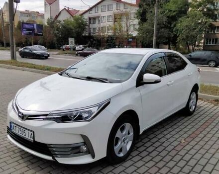 Білий Тойота Королла, об'ємом двигуна 1.6 л та пробігом 77 тис. км за 14000 $, фото 13 на Automoto.ua