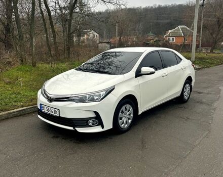 Білий Тойота Королла, об'ємом двигуна 1.6 л та пробігом 205 тис. км за 13700 $, фото 2 на Automoto.ua