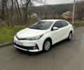 Білий Тойота Королла, об'ємом двигуна 1.6 л та пробігом 205 тис. км за 13700 $, фото 2 на Automoto.ua