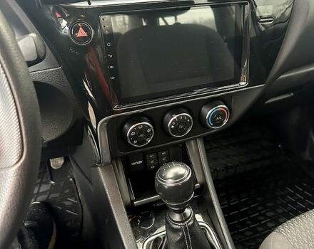 Білий Тойота Королла, об'ємом двигуна 1.6 л та пробігом 205 тис. км за 13700 $, фото 10 на Automoto.ua