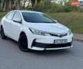 Білий Тойота Королла, об'ємом двигуна 1.33 л та пробігом 268 тис. км за 8900 $, фото 18 на Automoto.ua