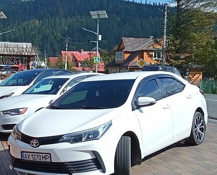 Белый Тойота Королла, объемом двигателя 1.3 л и пробегом 165 тыс. км за 11500 $, фото 4 на Automoto.ua