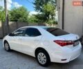 Білий Тойота Королла, об'ємом двигуна 1.33 л та пробігом 90 тис. км за 11900 $, фото 3 на Automoto.ua