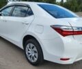 Білий Тойота Королла, об'ємом двигуна 1.6 л та пробігом 115 тис. км за 15001 $, фото 5 на Automoto.ua