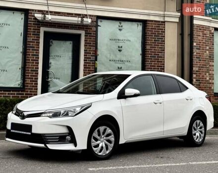 Білий Тойота Королла, об'ємом двигуна 1.6 л та пробігом 45 тис. км за 18000 $, фото 7 на Automoto.ua