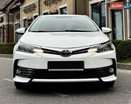 Білий Тойота Королла, об'ємом двигуна 1.6 л та пробігом 45 тис. км за 18000 $, фото 4 на Automoto.ua