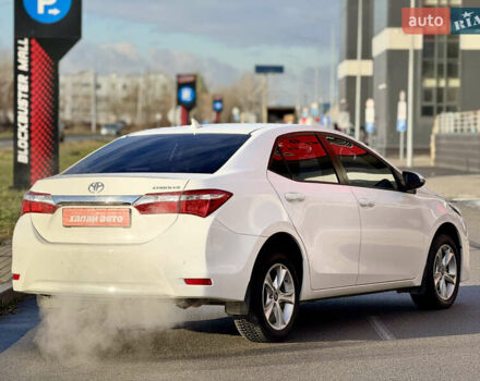 Белый Тойота Королла, объемом двигателя 1.6 л и пробегом 155 тыс. км за 12900 $, фото 4 на Automoto.ua