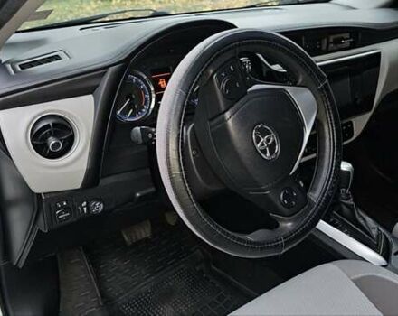 Белый Тойота Королла, объемом двигателя 1.8 л и пробегом 112 тыс. км за 12000 $, фото 10 на Automoto.ua