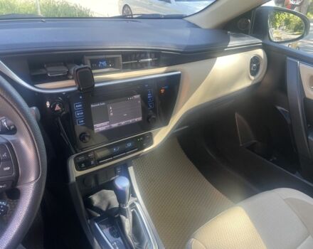 Белый Тойота Королла, объемом двигателя 1.8 л и пробегом 52 тыс. км за 12300 $, фото 5 на Automoto.ua