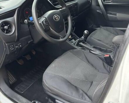 Белый Тойота Королла, объемом двигателя 1.6 л и пробегом 103 тыс. км за 13000 $, фото 3 на Automoto.ua