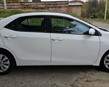 Белый Тойота Королла, объемом двигателя 1.8 л и пробегом 112 тыс. км за 12000 $, фото 9 на Automoto.ua