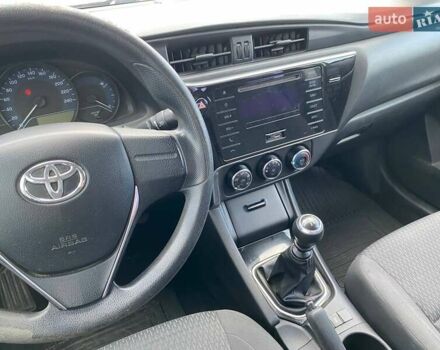 Белый Тойота Королла, объемом двигателя 1.6 л и пробегом 285 тыс. км за 10500 $, фото 21 на Automoto.ua