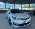 Білий Тойота Королла, об'ємом двигуна 1.6 л та пробігом 186 тис. км за 14624 $, фото 1 на Automoto.ua