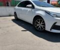 Білий Тойота Королла, об'ємом двигуна 1.6 л та пробігом 117 тис. км за 12700 $, фото 1 на Automoto.ua