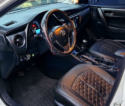 Белый Тойота Королла, объемом двигателя 1.3 л и пробегом 115 тыс. км за 12000 $, фото 7 на Automoto.ua