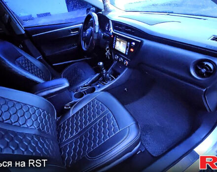 Белый Тойота Королла, объемом двигателя 1.3 л и пробегом 115 тыс. км за 12000 $, фото 5 на Automoto.ua