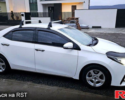 Белый Тойота Королла, объемом двигателя 1.3 л и пробегом 115 тыс. км за 12000 $, фото 2 на Automoto.ua