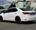 Білий Тойота Королла, об'ємом двигуна 1.33 л та пробігом 188 тис. км за 7999 $, фото 5 на Automoto.ua