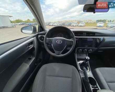 Белый Тойота Королла, объемом двигателя 1.6 л и пробегом 285 тыс. км за 10500 $, фото 14 на Automoto.ua