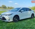 Білий Тойота Королла, об'ємом двигуна 1.6 л та пробігом 77 тис. км за 20000 $, фото 1 на Automoto.ua