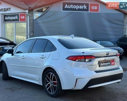 Белый Тойота Королла, объемом двигателя 1.8 л и пробегом 169 тыс. км за 20290 $, фото 3 на Automoto.ua