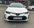 Білий Тойота Королла, об'ємом двигуна 1.8 л та пробігом 320 тис. км за 23950 $, фото 1 на Automoto.ua