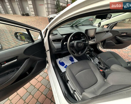 Белый Тойота Королла, объемом двигателя 1.49 л и пробегом 161 тыс. км за 14450 $, фото 119 на Automoto.ua