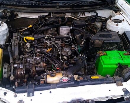 Белый Тойота Королла, объемом двигателя 2 л и пробегом 222 тыс. км за 1800 $, фото 2 на Automoto.ua