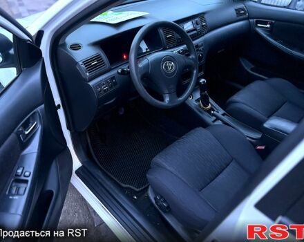 Белый Тойота Королла, объемом двигателя 1.4 л и пробегом 215 тыс. км за 4200 $, фото 8 на Automoto.ua