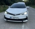 Білий Тойота Королла, об'ємом двигуна 1.3 л та пробігом 121 тис. км за 11467 $, фото 1 на Automoto.ua