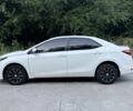 Білий Тойота Королла, об'ємом двигуна 1.3 л та пробігом 121 тис. км за 11467 $, фото 6 на Automoto.ua