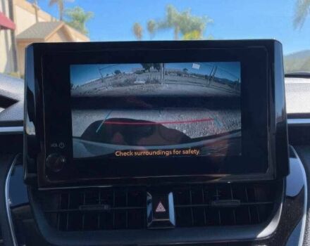 Белый Тойота Королла, объемом двигателя 2 л и пробегом 20 тыс. км за 12000 $, фото 8 на Automoto.ua