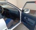 Білий Тойота Королла, об'ємом двигуна 1.3 л та пробігом 350 тис. км за 1099 $, фото 6 на Automoto.ua