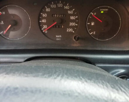 Белый Тойота Королла, объемом двигателя 1.3 л и пробегом 400 тыс. км за 2000 $, фото 16 на Automoto.ua