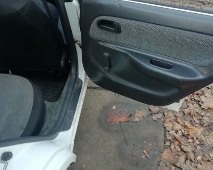 Белый Тойота Королла, объемом двигателя 1.3 л и пробегом 400 тыс. км за 2000 $, фото 21 на Automoto.ua