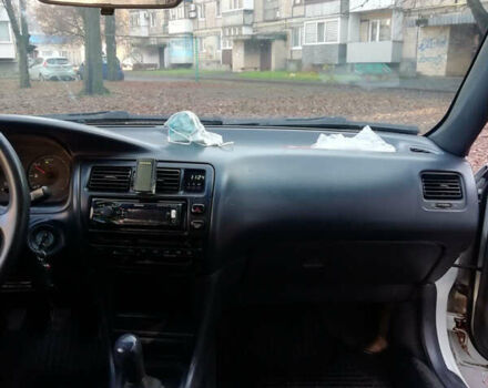 Белый Тойота Королла, объемом двигателя 1.3 л и пробегом 400 тыс. км за 2000 $, фото 17 на Automoto.ua