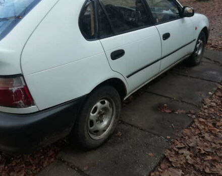 Белый Тойота Королла, объемом двигателя 1.3 л и пробегом 400 тыс. км за 2000 $, фото 14 на Automoto.ua