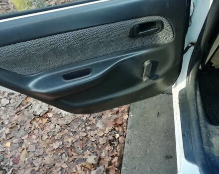 Белый Тойота Королла, объемом двигателя 1.3 л и пробегом 400 тыс. км за 2000 $, фото 13 на Automoto.ua