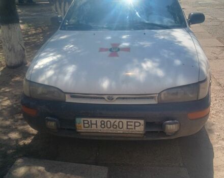 Білий Тойота Королла, об'ємом двигуна 1.3 л та пробігом 455 тис. км за 1574 $, фото 2 на Automoto.ua