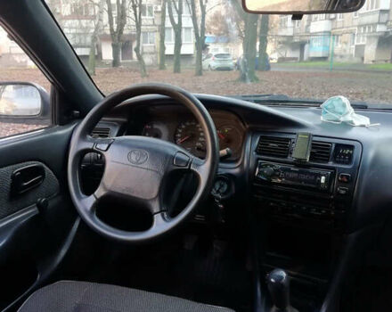 Белый Тойота Королла, объемом двигателя 1.3 л и пробегом 400 тыс. км за 2000 $, фото 26 на Automoto.ua