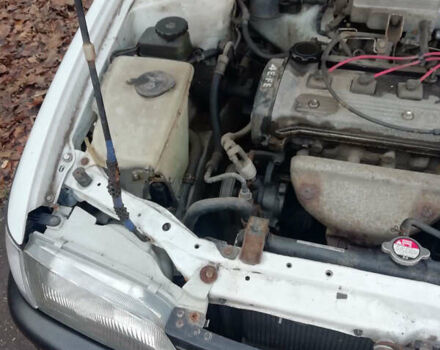 Белый Тойота Королла, объемом двигателя 1.3 л и пробегом 400 тыс. км за 2000 $, фото 12 на Automoto.ua