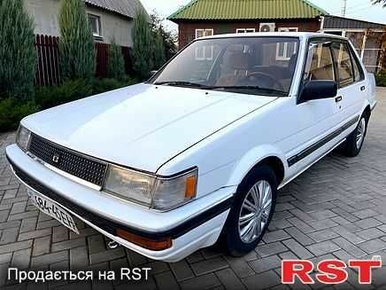 Білий Тойота Королла, об'ємом двигуна 1.5 л та пробігом 260 тис. км за 829 $, фото 1 на Automoto.ua