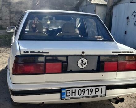 Белый Тойота Королла, объемом двигателя 1.45 л и пробегом 100 тыс. км за 1100 $, фото 1 на Automoto.ua