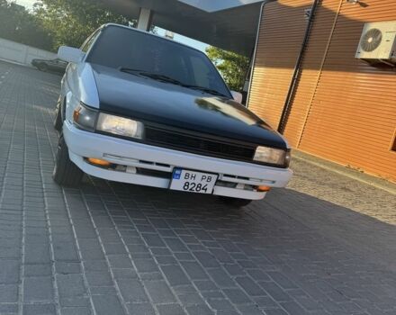 Белый Тойота Королла, объемом двигателя 1.3 л и пробегом 235 тыс. км за 1350 $, фото 1 на Automoto.ua