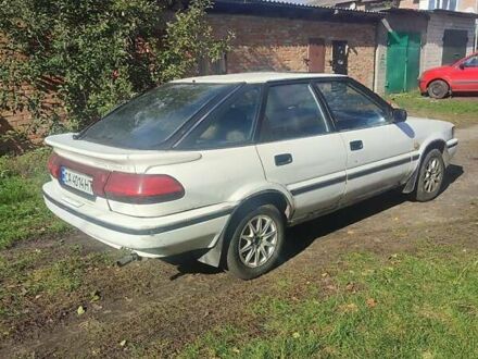 Белый Тойота Королла, объемом двигателя 1.59 л и пробегом 400 тыс. км за 800 $, фото 1 на Automoto.ua