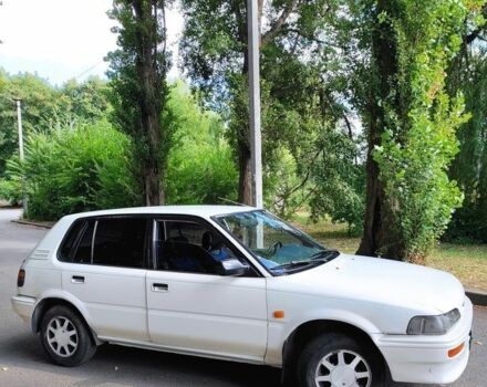 Білий Тойота Королла, об'ємом двигуна 1.3 л та пробігом 214 тис. км за 1400 $, фото 1 на Automoto.ua